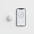SpineCraft AlignTrack Bluetooth posture wearable with companion app on iPhone hero shot